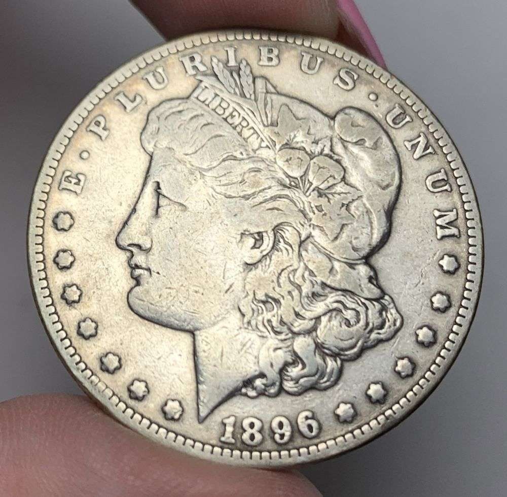 1896-S Morgan Silver Dollar Fine: This is (1) coin from a book that we received along with the heavy black book of silver dollars. Winner shall receive the exact coin shown here. (MR/PB)