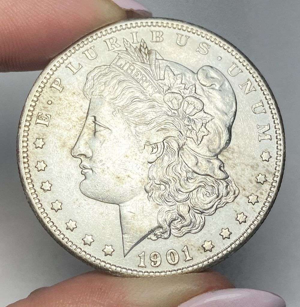 1901-S Morgan Silver Dollar AU58 Details: This is (1) coin from a book that we received along with the heavy black book of silver dollars. Winner shall receive the exact coin shown here. (MR/PB)