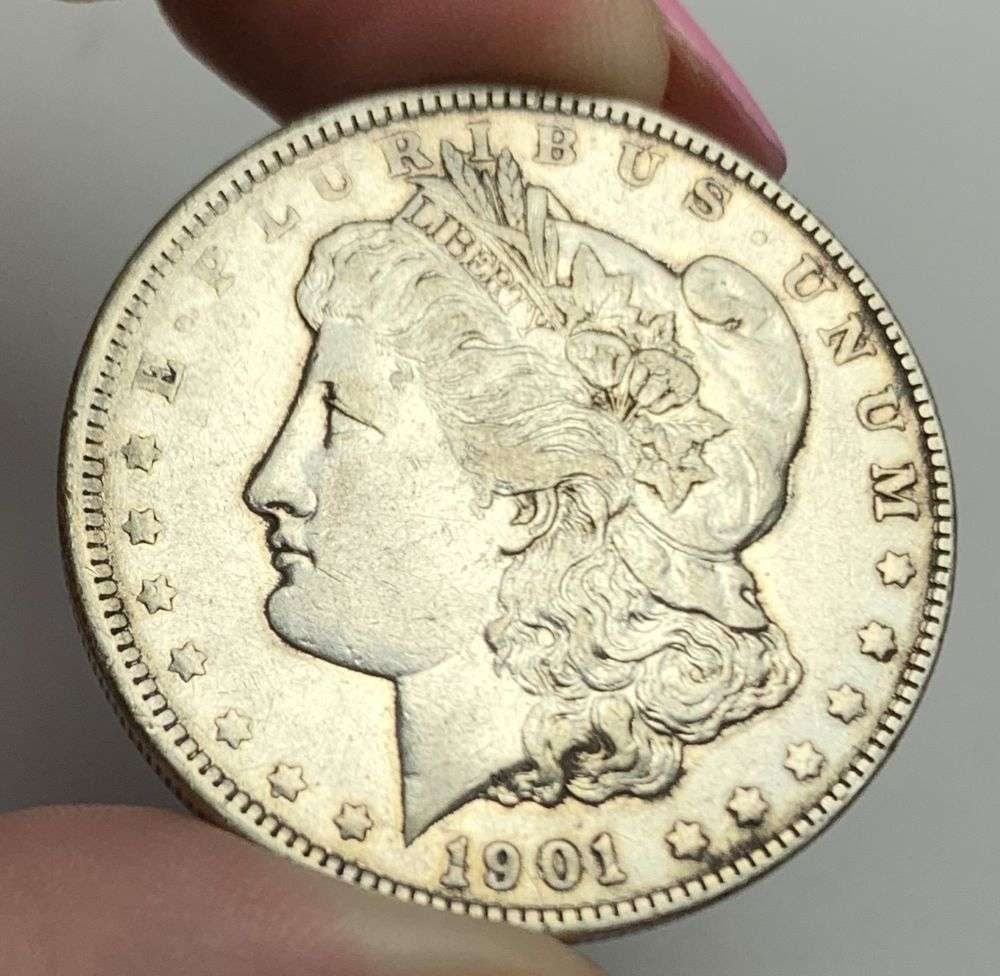 1901 Morgan Silver Dollar AU55: This is (1) coin from a book that we received along with the heavy black book of silver dollars. Winner shall receive the exact coin shown here. (MR/PB)