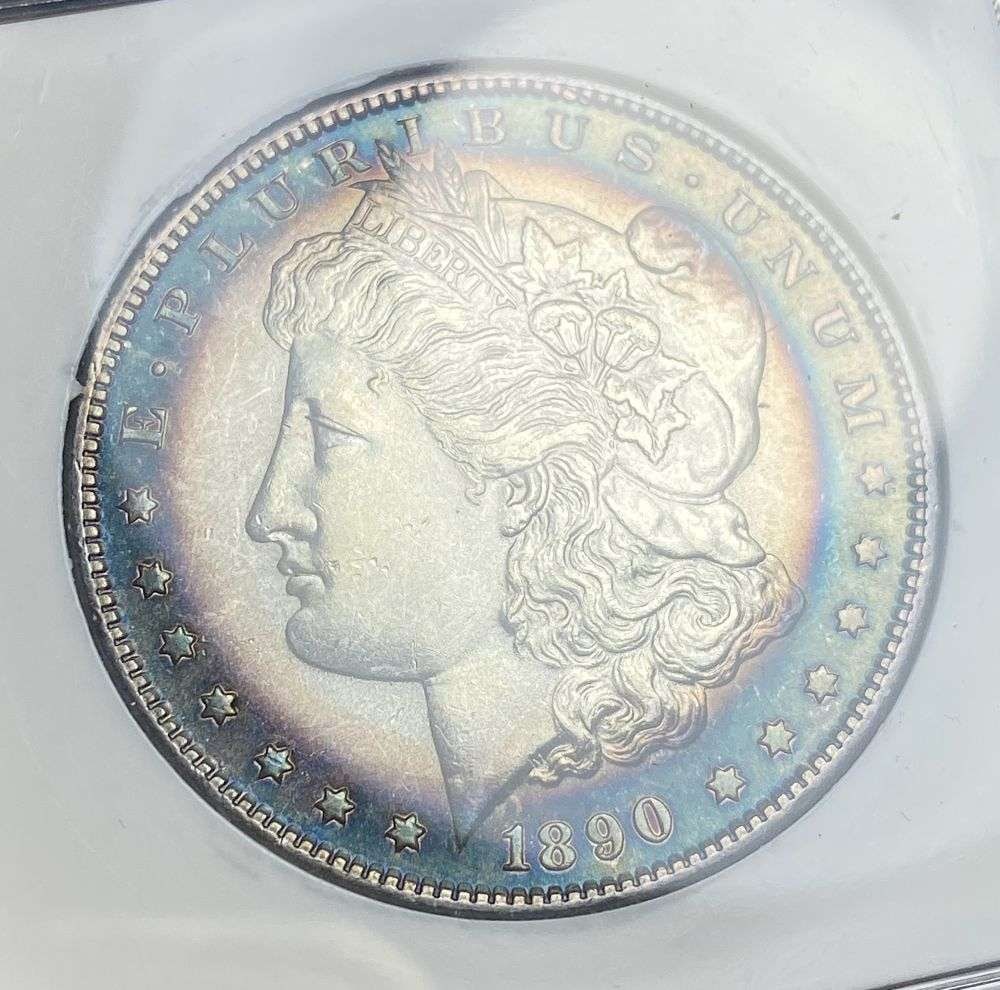 Toned 1890-S Morgan Silver Dollar MS65: IMPORTANT NOTE: We do not agree with the grade provided with this "off-brand" grading company. Winner shall receive the exact coin shown here. (RR)