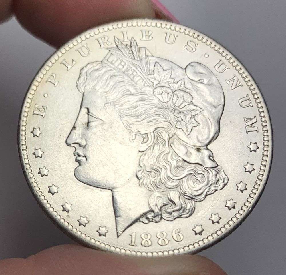 1886-O Morgan Silver Dollar AU58 Details (1 of 2)