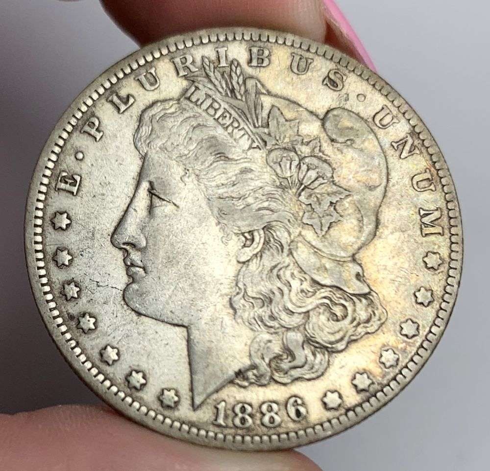 1886-O Morgan Silver Dollar AU53: This consignment, we hope to offer over time across our various Whatnot channels, with the best material featured in our Wednesday auctions. We hope to be done with this stuff by the beginning of 2027