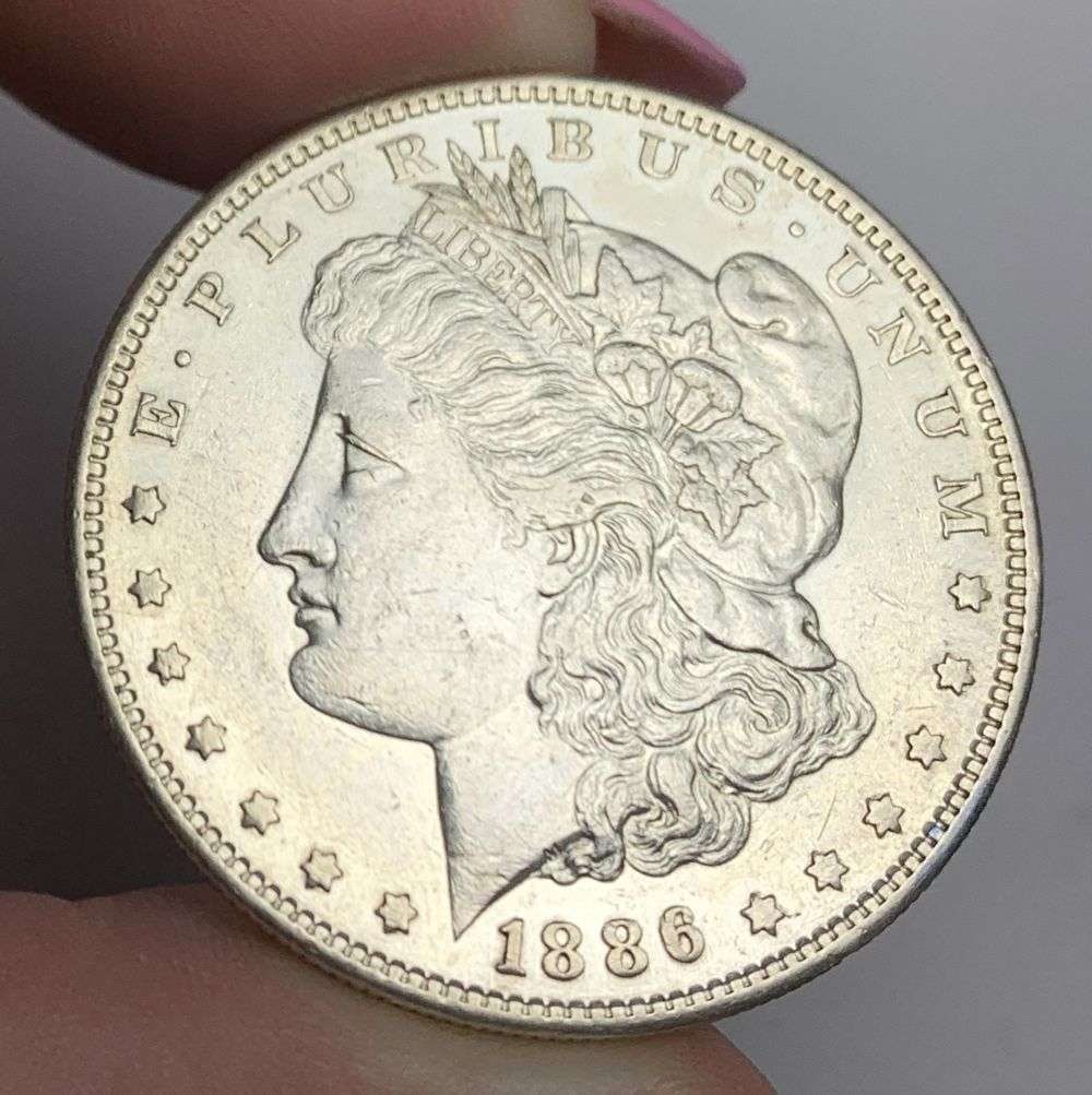 1886-S Morgan Silver Dollar AU55: This consignment, we hope to offer over time across our various Whatnot channels, with the best material featured in our Wednesday auctions. We hope to be done with this stuff by the beginning of 2027
