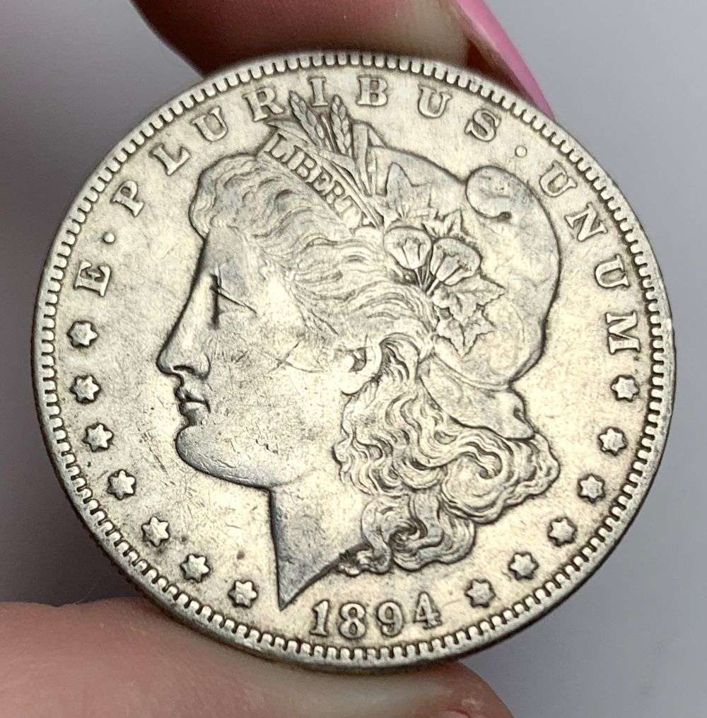1894-O Morgan Silver Dollar AU53 Details: This consignment, we hope to offer over time across our various Whatnot channels, with the best material featured in our Wednesday auctions. We hope to be done with this stuff by the beginning of 2027