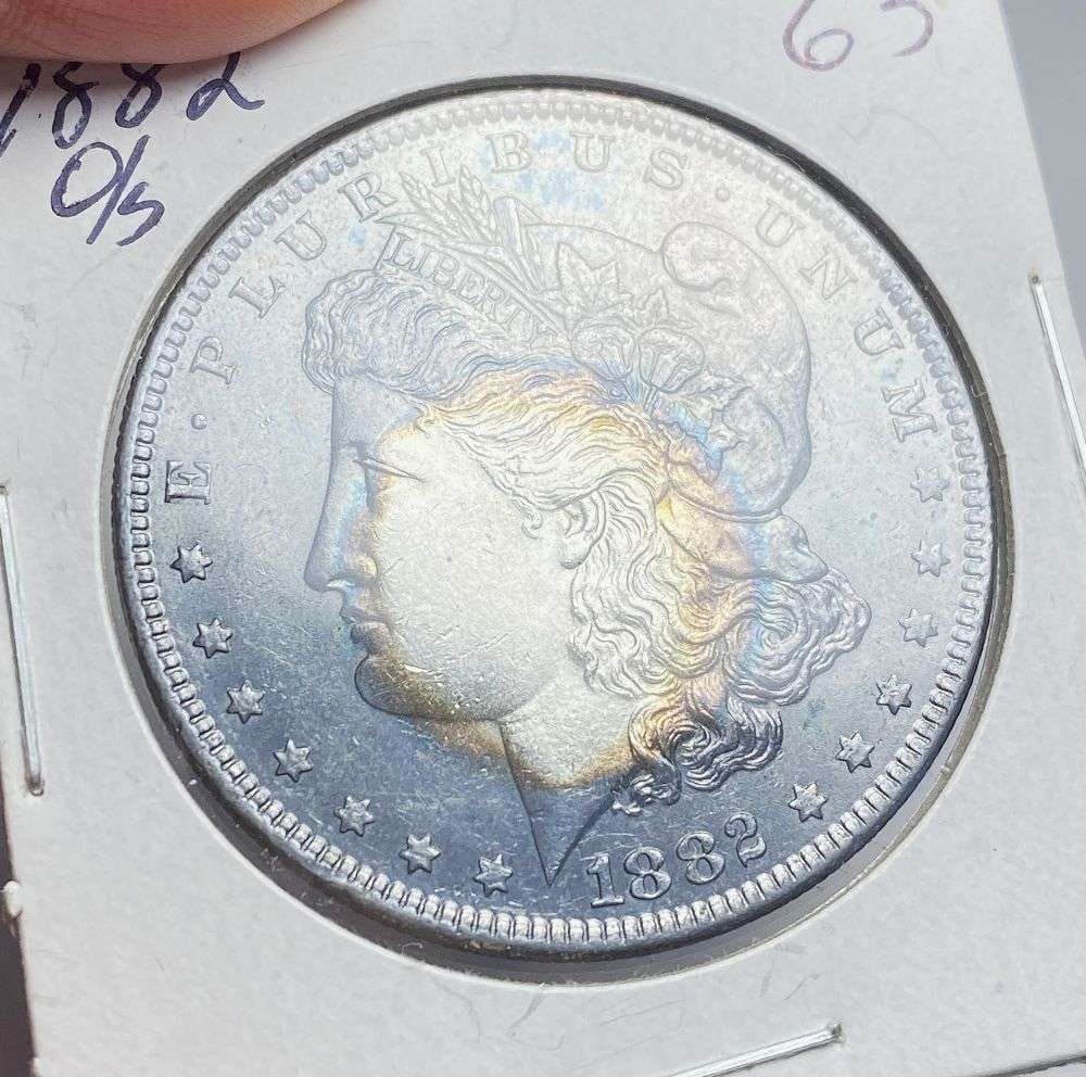 Toned 1882-O/S Morgan Silver Dollar: Winner shall receive the exact coin shown here. (RR)