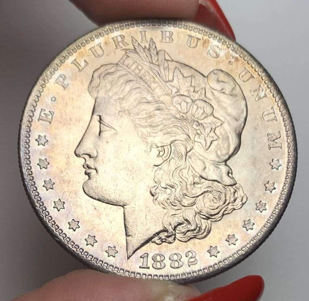 Sick Toning 1882-S Morgan Silver Dollar MS66: A very special consignment. Once in a great while, some really, really nice silver dollars will hit the market. These coins come from a old, old-timer! By order of the consignor, none of these coins a