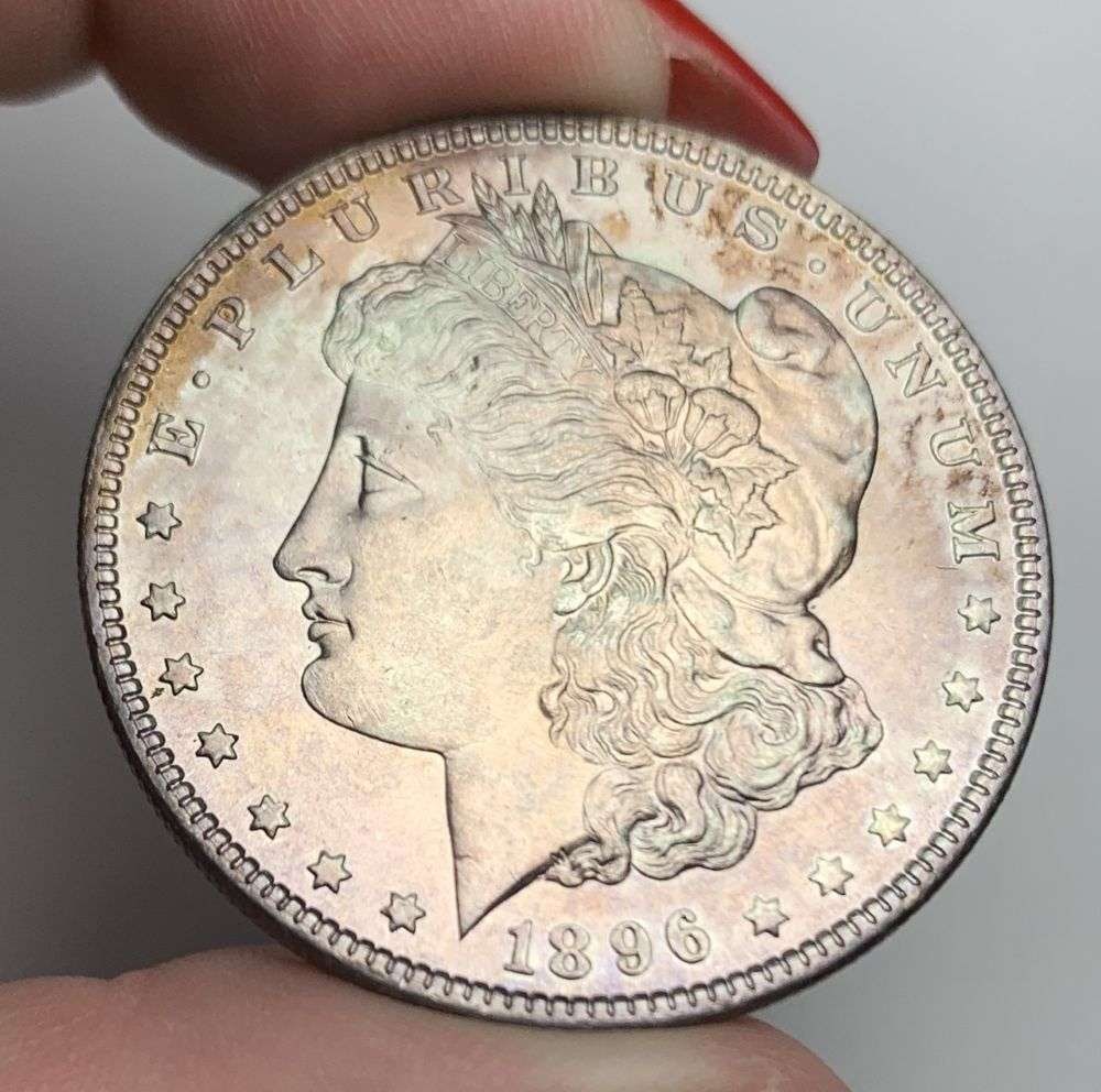 Sick Toning 1896 Morgan Silver Dollar MS66: A very special consignment. Once in a great while, some really, really nice silver dollars will hit the market. These coins come from a old, old-timer! By order of the consignor, none of these coins a