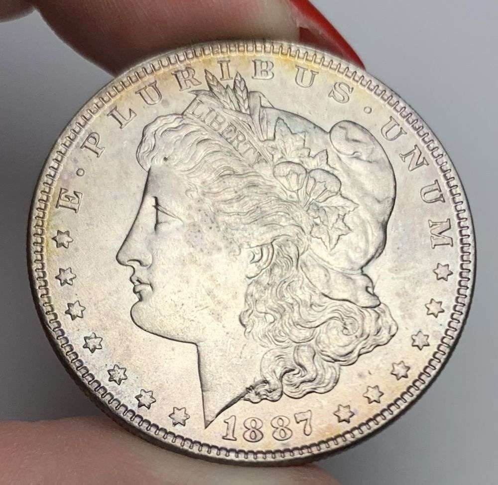 Sick Toning 1887 Morgan Silver Dollar MS64+: A very special consignment. Once in a great while, some really, really nice silver dollars will hit the market. These coins come from a old, old-timer! By order of the consignor, none of these coins a