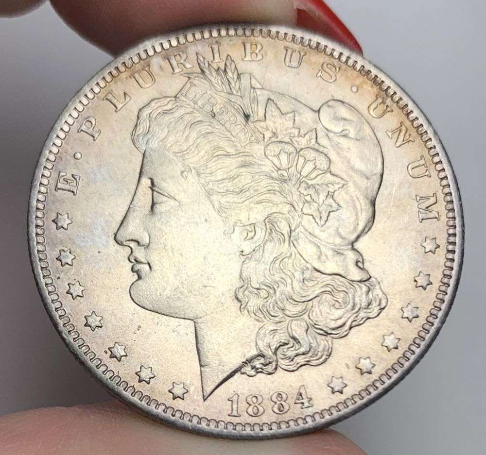 Sick Toning 1884-O Morgan Silver Dollar MS66: A very special consignment. Once in a great while, some really, really nice silver dollars will hit the market. These coins come from a old, old-timer! By order of the consignor, none of these coins a