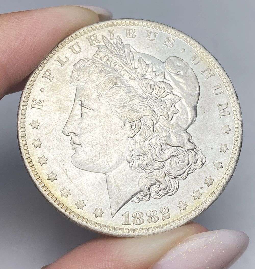 Last Minute! 1882-O Morgan Silver Dollar MS65: A very special consignment. Once in a great while, some really, really nice silver dollars will hit the market. These coins come from a old, old-timer! By order of the consignor, none of these coins a