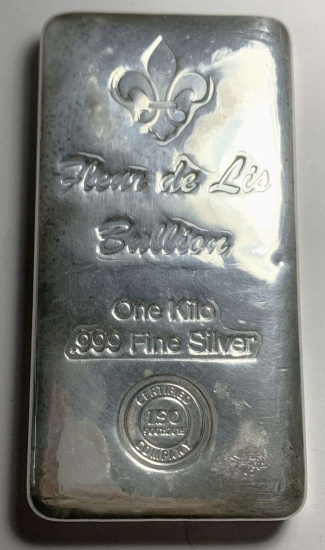 Fleur De Lis Bullion 1 Kilo .999 Silver Bar: Winner shall receive the exact bar shown here. (NH/B)