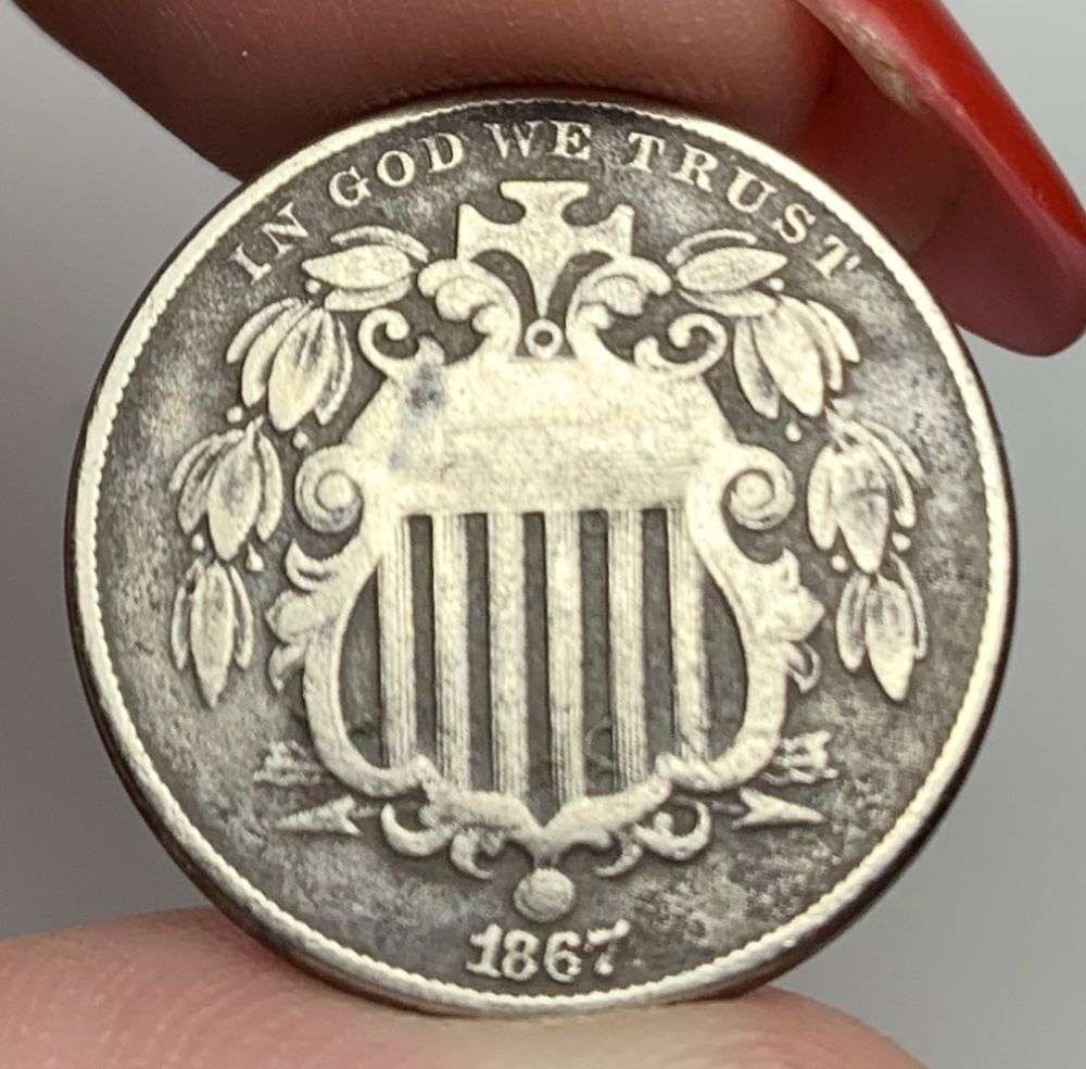 1867 Shield Silver Nickel Fine: This is the story about two coin dealers, a partnership. One, the largest bullion dealer north of San Francisco, and the other, the largest rare coin dealer north of San Francisco. Together, their sho