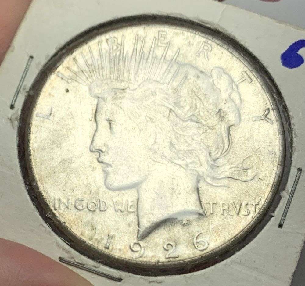 1926-S Peace Silver Dollar MS64: This coin is in a flip with an old inaccurate pricing of $4.00. Winner shall recieve the exact coin shown here. (NH/EB)