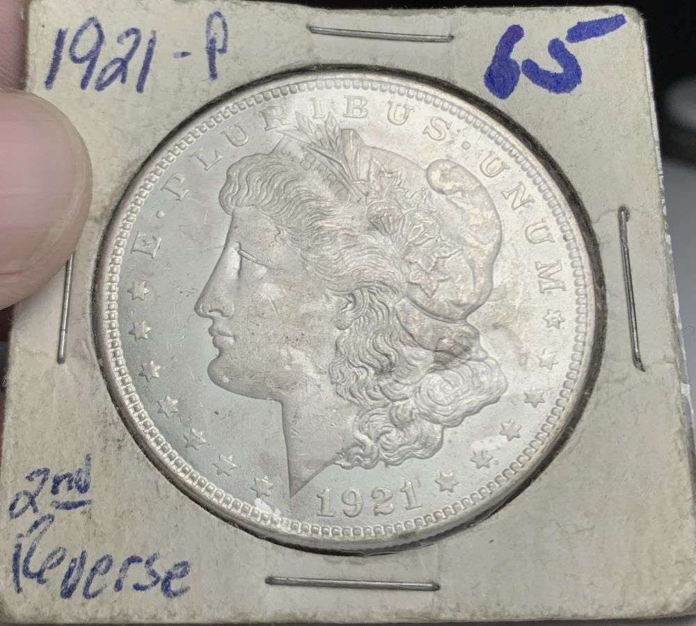 1921 Morgan Silver Dollar MS65: Winner shall receive the exact coin shown here. (NH/EB)