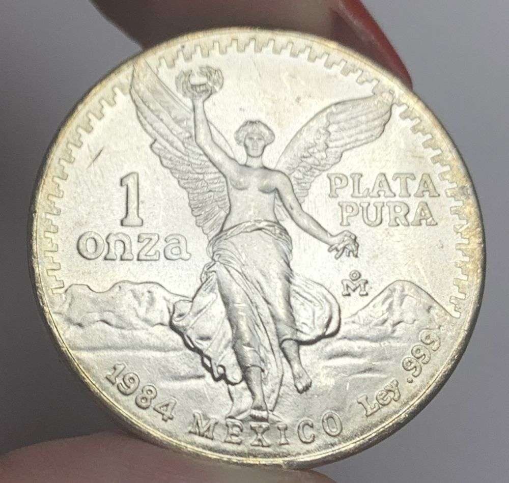 Rare 1984 Mexican Libertad 1 Onza 1 ozt .999 Silver: Winner shall receive the exact coin shown here. (MR/UR)