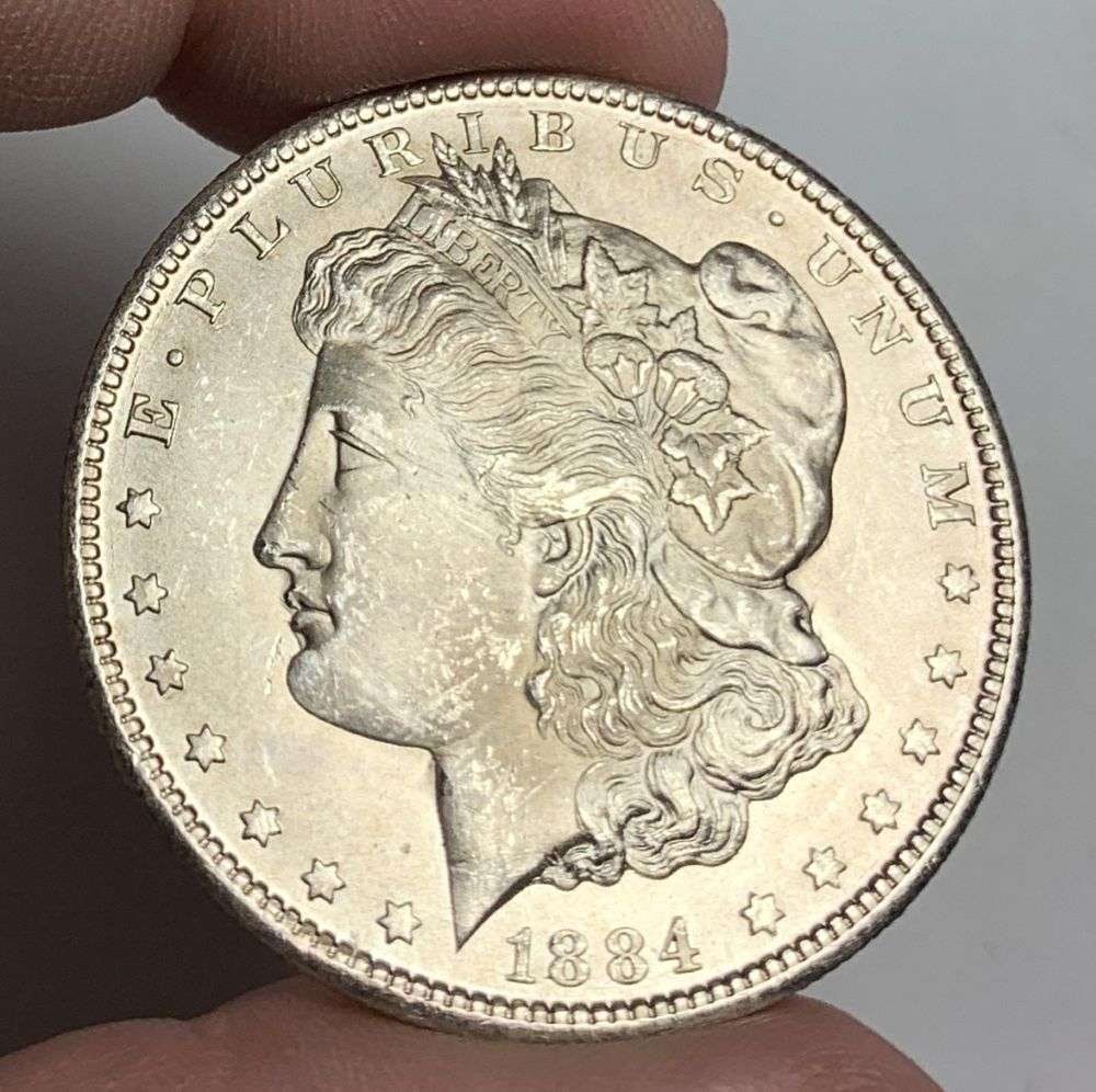 1884-CC Morgan Silver Dollar MS64: Winner shall receive the exact coin shown here. (MR/UBB)