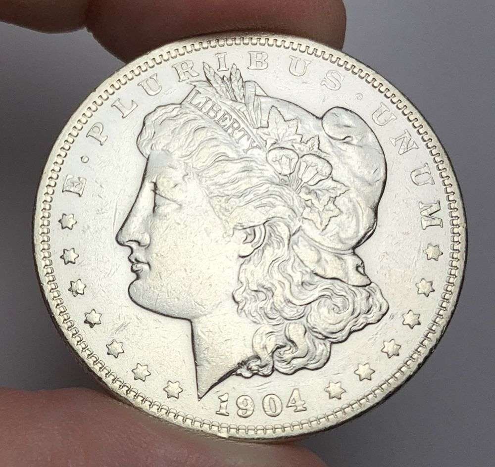 1904 Morgan Silver Dollar AU50 Details: Winner shall receive the exact coin shown here. (MR/B)