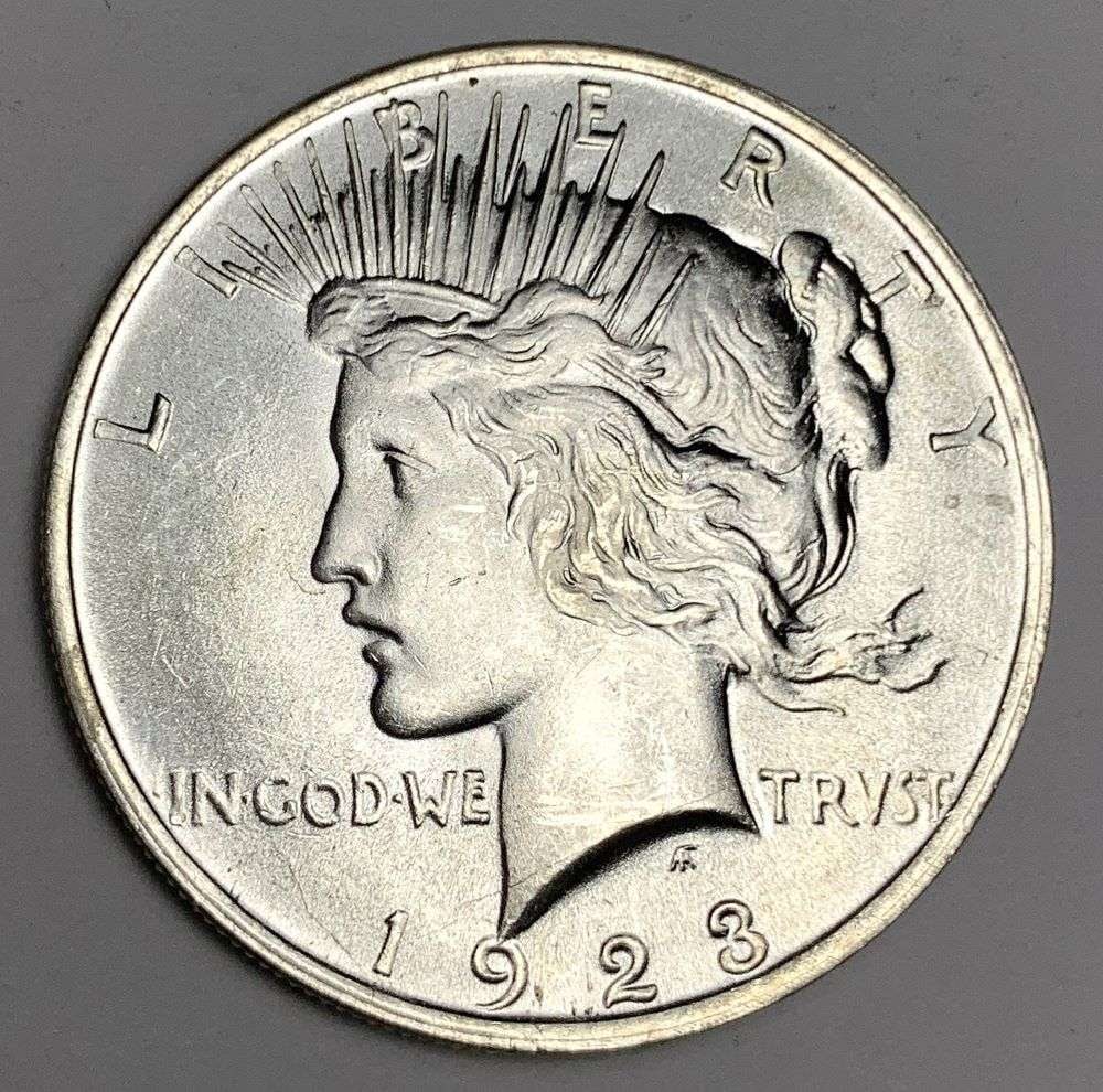 1923 Peace Silver Dollar MS64: Winner shall receive the exact coin shown here. (NH/B)