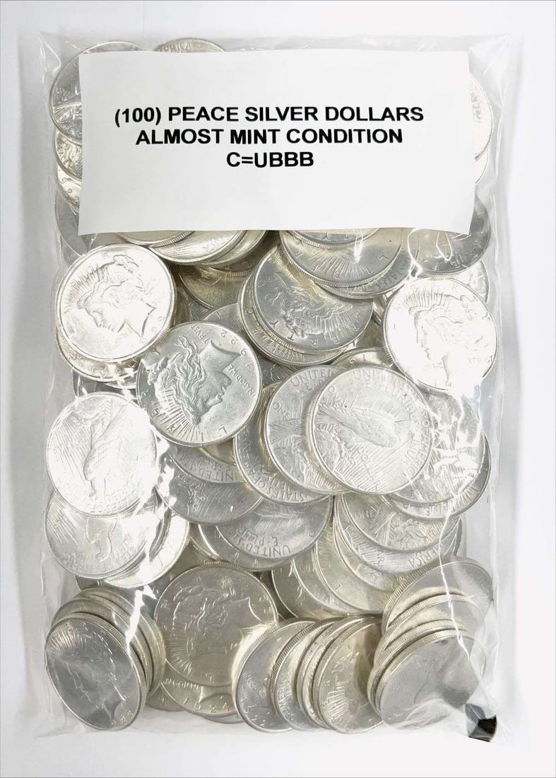(100) Almost Mint Peace Silver Dollars: Winner shall receive (100-coins) precisely resembling the coins shown here. This group is almost mint. We guarantee authenticity and the count and there are (100-coins) enclosed. Please allow 2-4 week