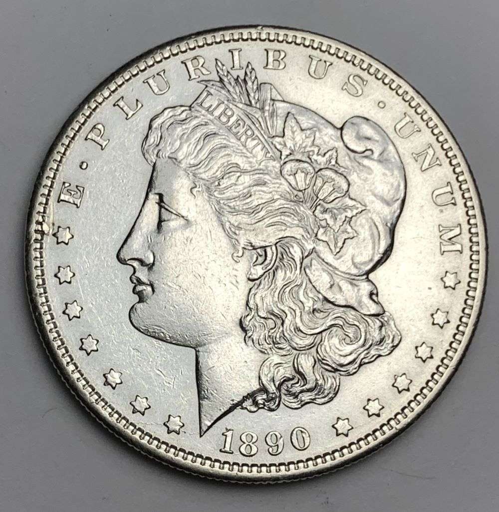 1890-S Morgan Silver Dollar MS64 Details: This is the story about two coin dealers, a partnership. One, the largest bullion dealer north of San Francisco, and the other, the largest rare coin dealer north of San Francisco. Together, their sho