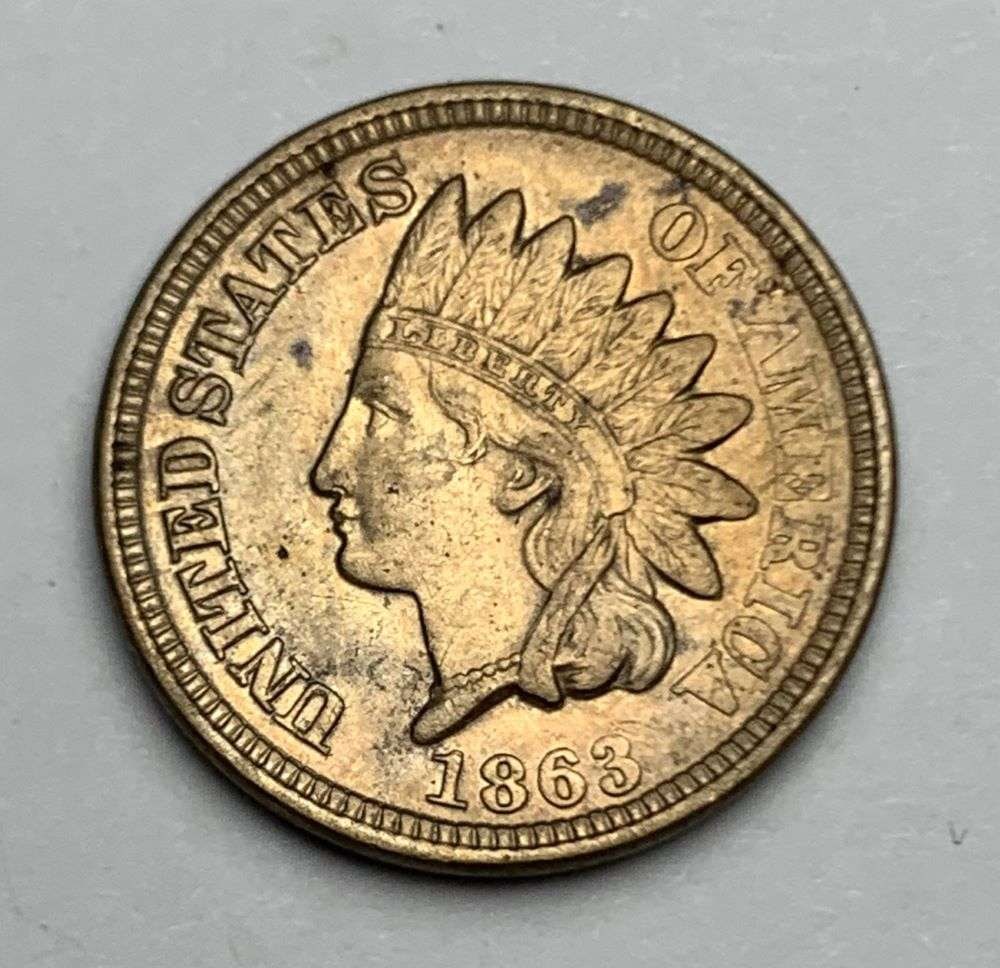 1863 Indian Head Cent MS63 Details: This is the story about two coin dealers, a partnership. One, the largest bullion dealer north of San Francisco, and the other, the largest rare coin dealer north of San Francisco. Together, their sho