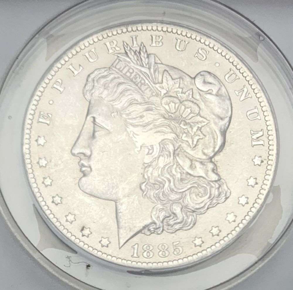 1885-O Morgan Silver Dollar ANACS MS64: Winner shall receive the exact coin shown here. (MR/FR)