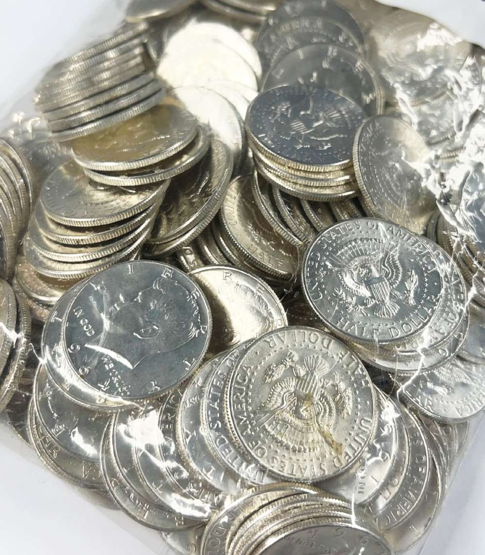 Bag of 1964 Almost Mint 90% Silver JFK $50 Face: Winner of lot shall receive (100) almost mint, 90% silver, 1964 JFK half dollars. That's (100) coins or $50 face value, delivered inside of a sealed bag. Please allow 2-4 weeks for shipping.