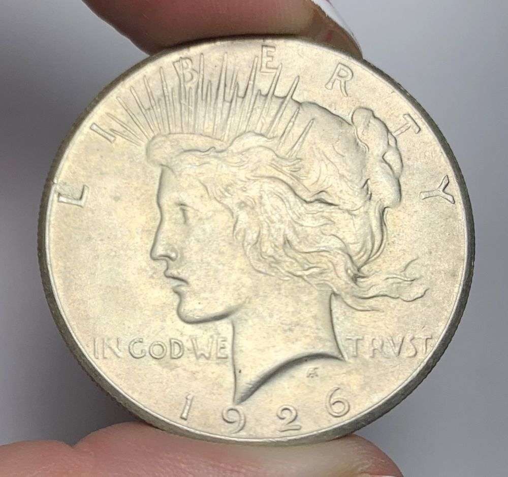 1926 Peace Silver Dollar MS65: Winner shall receive the exact coin shown here. (MR/PE)