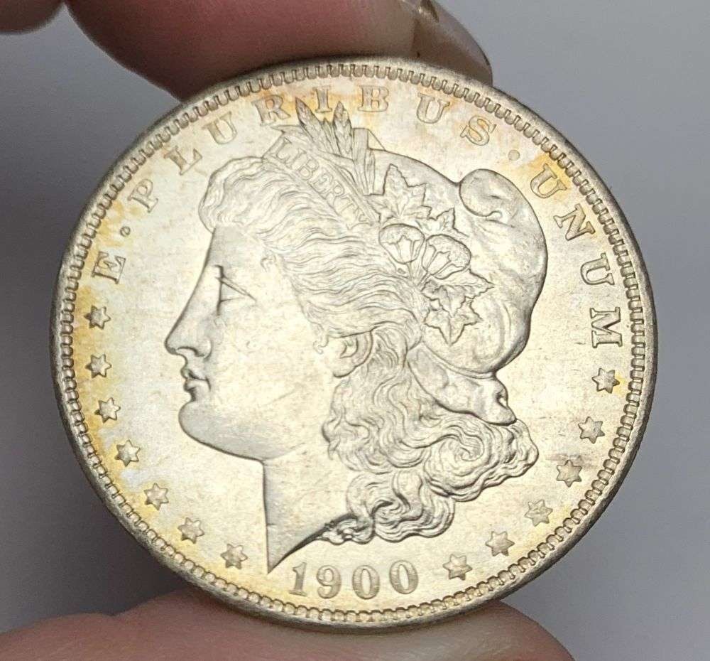 1900-O Morgan Silver Dollar MS64: Winner shall receive the exact coin shown here. (MR/OB)
