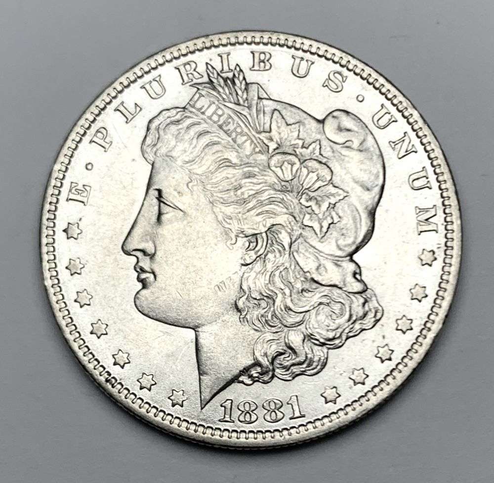1881-O Morgan Silver Dollar MS64: Winner shall receive the exact coin shown here. (NH/OB)