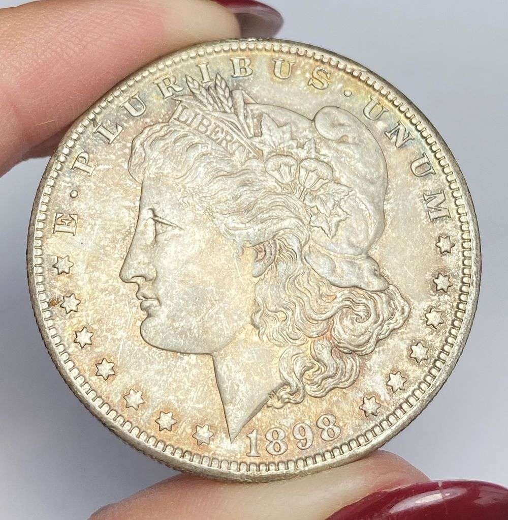 Exquisite Toner 1898-O Morgan Silver Dollar MS66: Winner shall receive the exact coin shown here. (RR/OB)