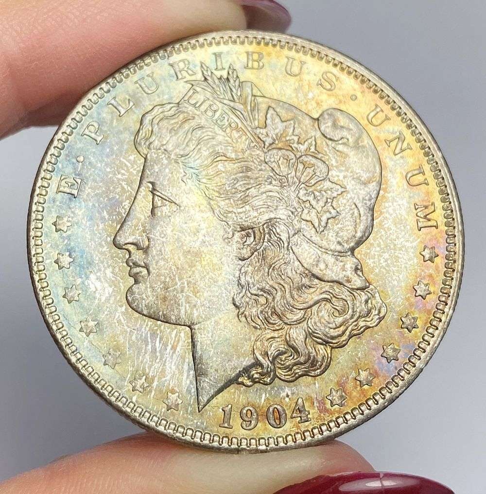 Exquisite Toner 1904-O Morgan Silver Dollar MS67: Winner shall receive the exact coin shown here. (RR/OB)
