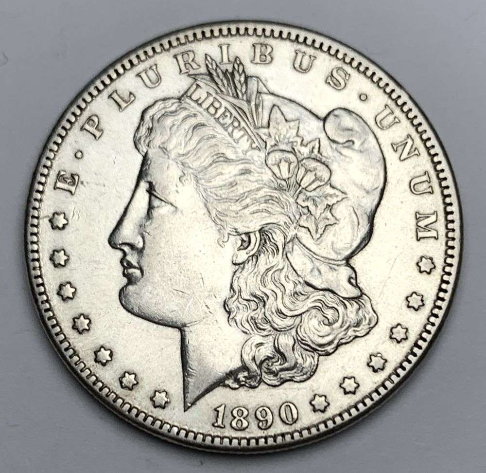 1890-CC Morgan Silver Dollar AU55: Winner shall receive the exact coin shown here. (NH/B)