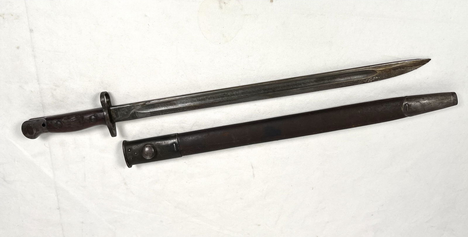 WWI English Bayonet Dagger with Leather Scabbard: WWI WWII English Enfield Rifle Bayonet Dagger Knife Sword with Mangrovite 42 Scabbard Marked 21.75" L 17" L Please look at Photos Closely Out of South Shore Nassau County Estate