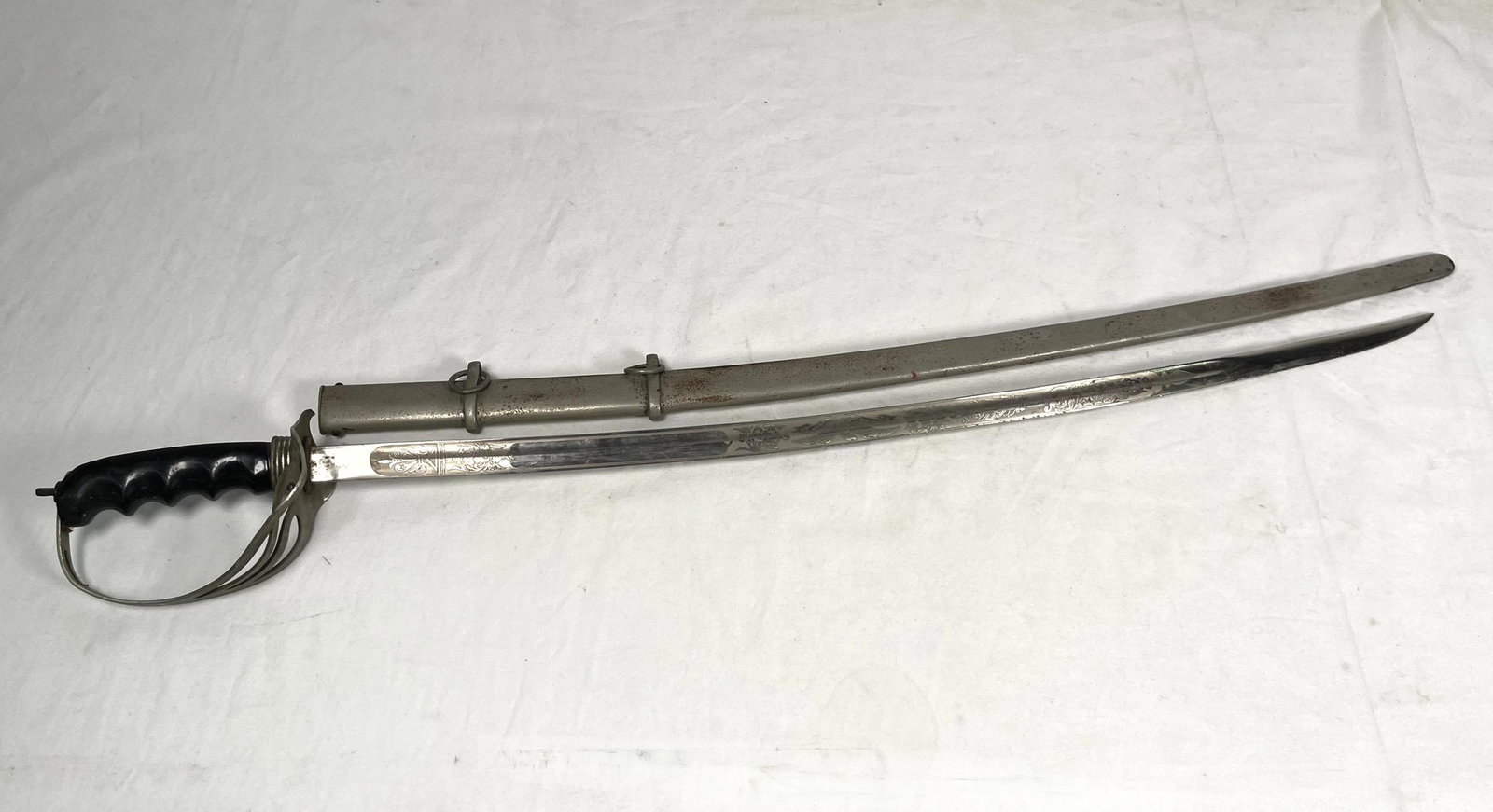 Sword with Scabbard: Sword with Steel Scabbard etched blade pierced tear drop design hand guard Gemsco Military Officers Sword Parade approx 31" L Please look at Photos Closely Out of a New York City Estate