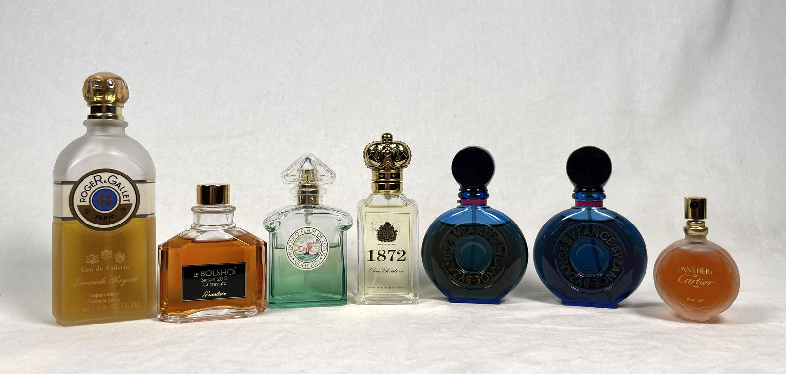 Lot of 7 Perfumes: Lot of 7 Perfume bottle 2x Rochas Byzance 1.7 FL OZ 1x Clive Christian 1872 England 1.7 FL OZ 1x Guerlain Mitsouko Fleur de Lotus 1.7 FL OZ 1x Le Bolshoi Saison 2012 La Traviata Guerlain 2 FL OZ 1 x P