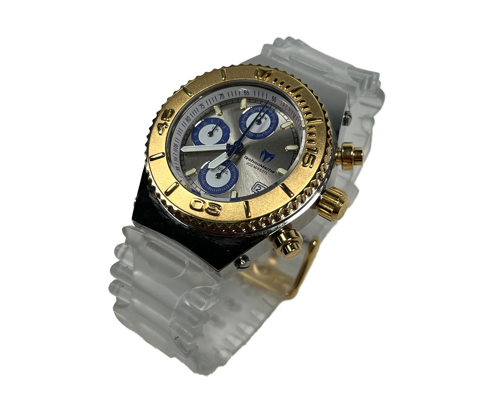 TechnoMarine Cruise Chronograph Two Tone Watch: TechnoMarine Cruise Chronograph Two Tone Women's Watch with Clear & Blue Rubber Watchband with buckle clasp Stainless Swiss Comes with Original Box Good Condition Please look at Photos Closely Out of