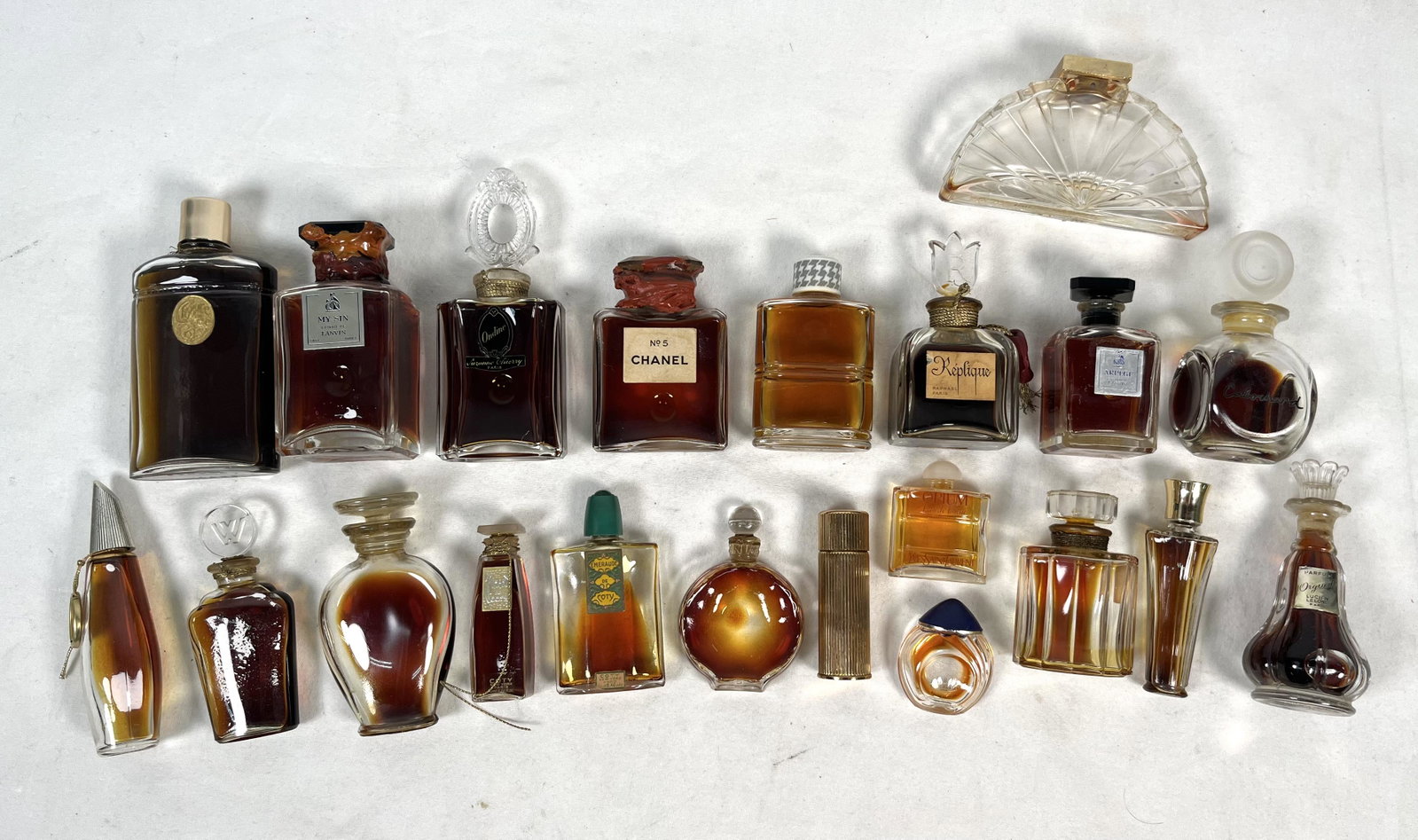 Lot of Vintage Perfume Bottles: Large Collection of Vintage Perfume Bottle No. 5 Chanel Ondine My Sin Extrait de Lanvin Emeraude De Coty Replique Raphael Paris Arpege Extrait de Lanvin Opium Yves Saint Laurent Cabochard Orgueil Luci