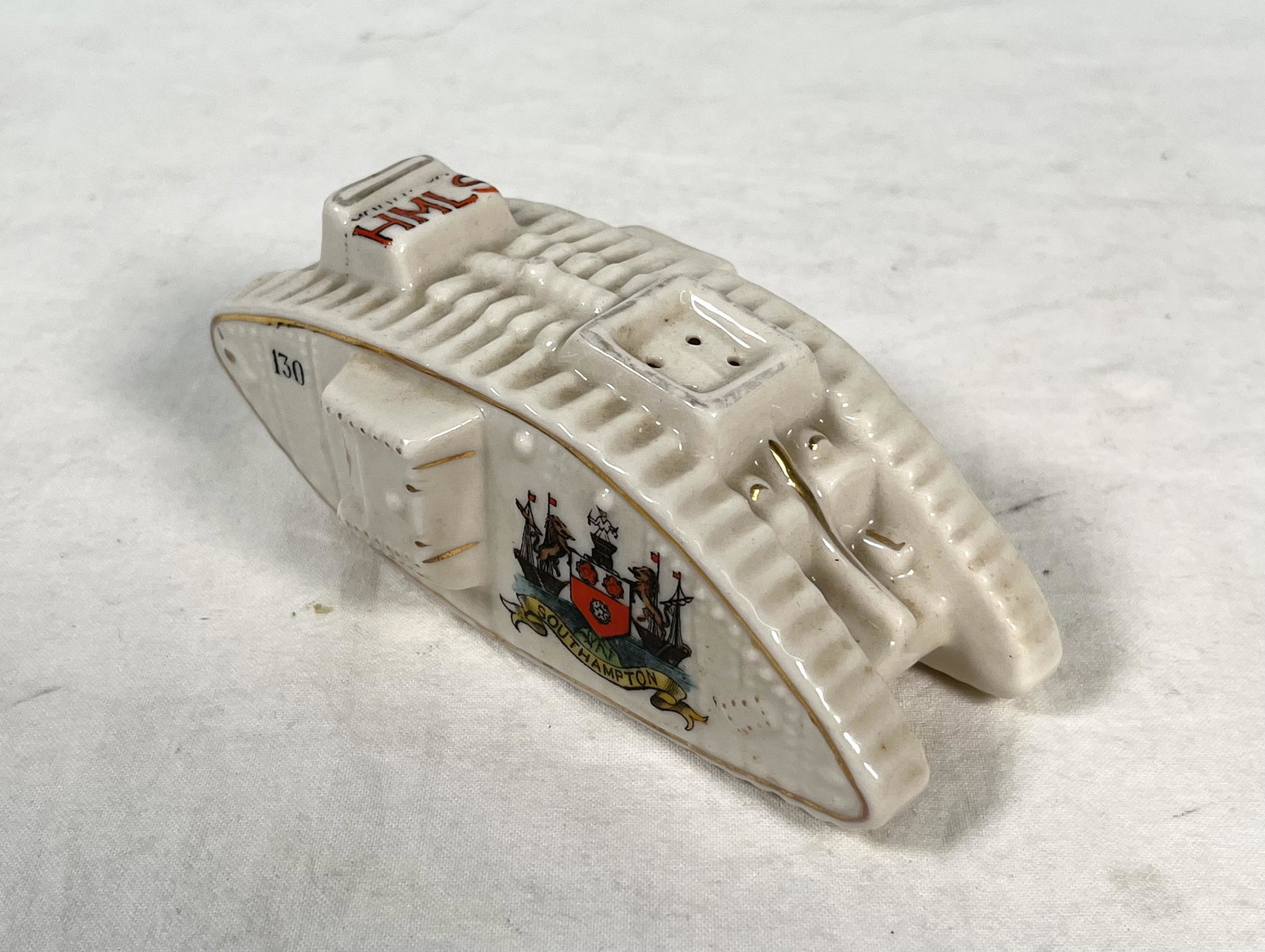 Carlton Ware WWI Tank Salt & Pepper Shaker: Carlton Ware WWI Crested Tank Salt & Pepper Shaker 5.25" L x 2" H overall good condition for its age few minor chips Please look at Photos Closely Out of a New York City Estate