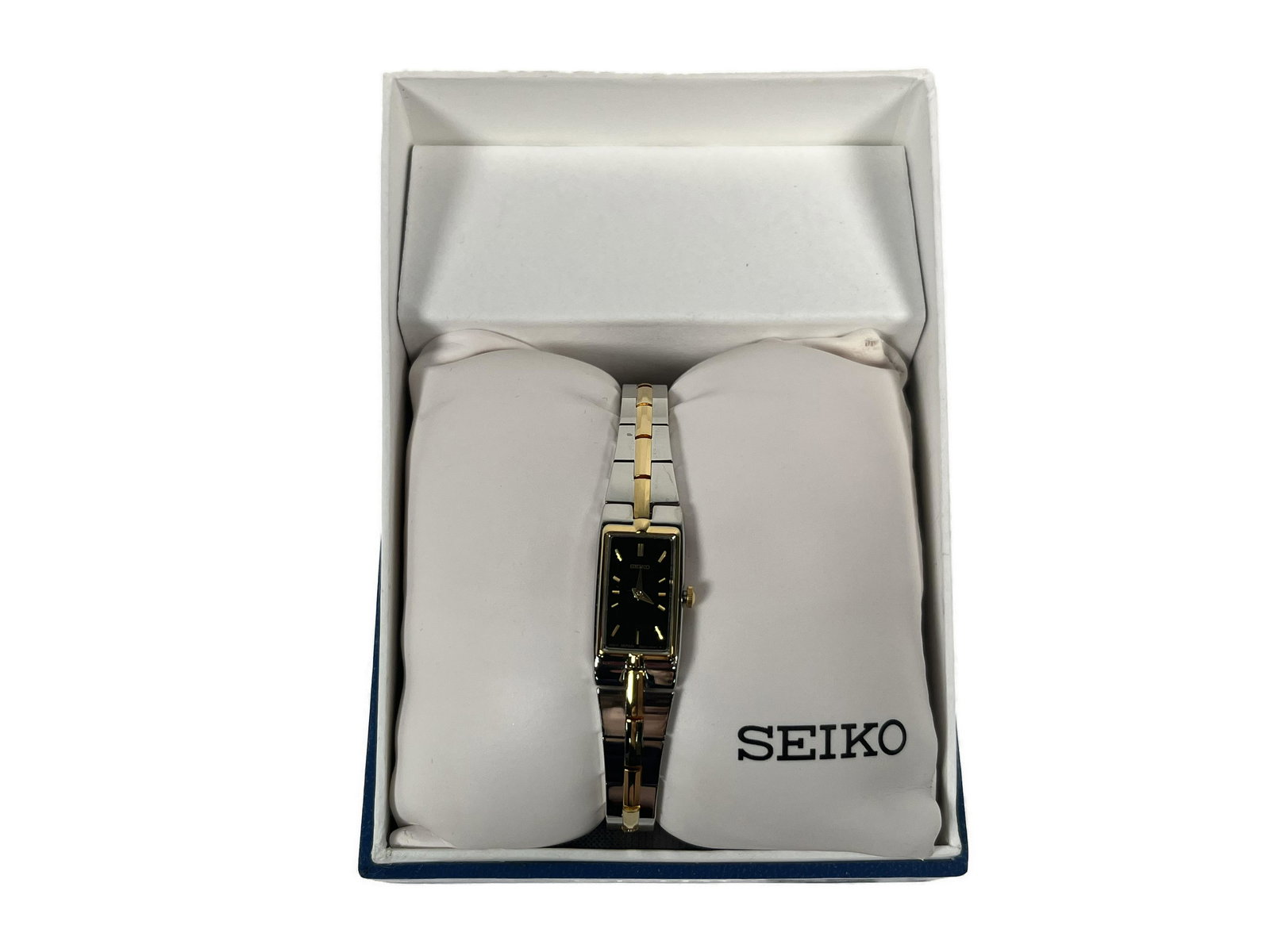 Seiko Watch: Seiko Classic Dress Watch White Face 15mm Diameter 6mm Thick Case including Hardlex Crystal Push/Pull Crown Three-fold clasp with push button release and Water-Resistant With a stainless steel & pvd p
