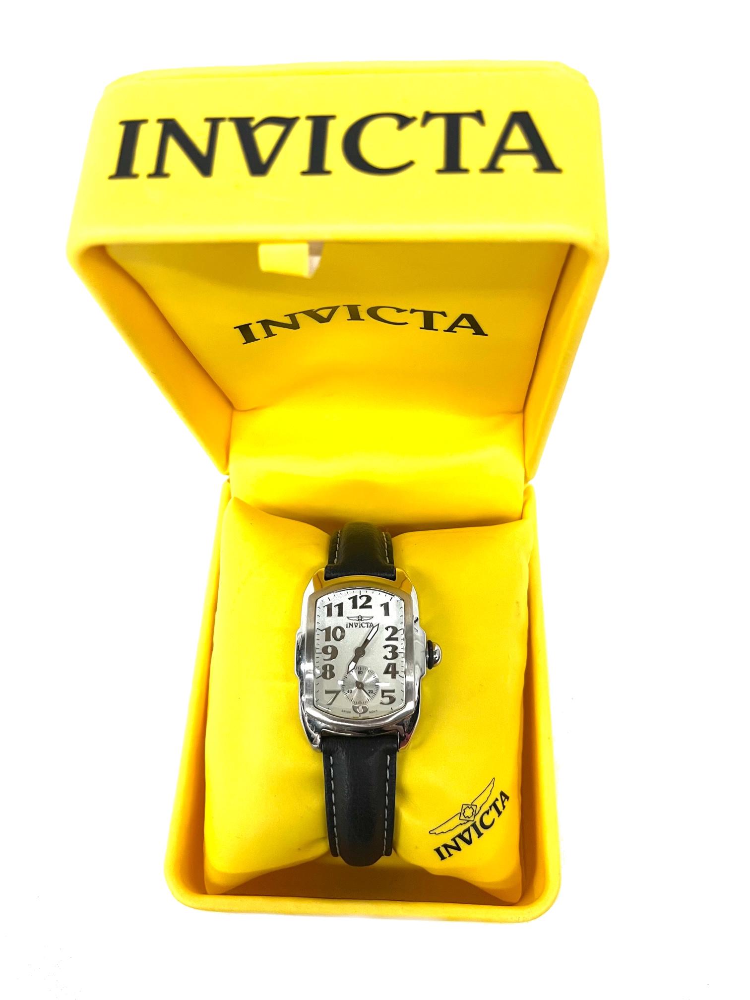 Invicta Lupah Ladies Watch: Beautiful Invicta Woman's Timepiece White Mother of Peral Dial Black Leather Band Model No. 2151 Watch Comes with Original Invicta Case in Good Condition Out of New York City Estate
