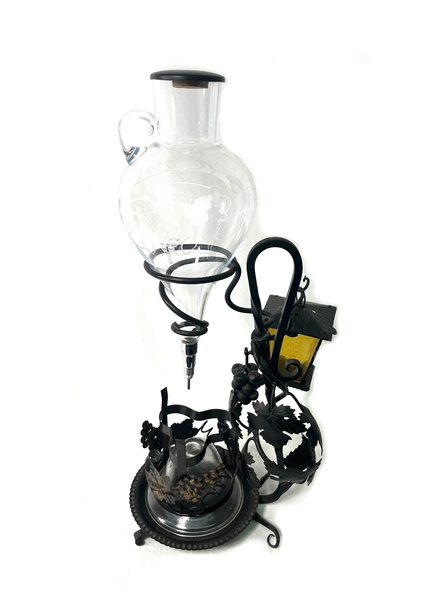 Wrought Iron & Glass Wine Decanter Aerator: Wrought Iron and Etched Art Glass Grape Vinew Design Wine Decanter Aerator Dispensor Server Votive Holder Good Condition Nice Looking Wine Dispenser made of Glass with Etched Grape Vine Design 20" tal