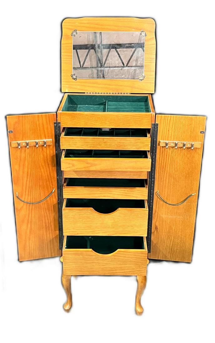 Powell Queen Anne Style Oak Jewelry Cabinet: Powell Queen Anne Style Oak Jewelry Cabinet The Top Opens With A Large Miror Six Drawers Each A Different Size And Compartment Setup Make It Very Versatile Hooks on Inside of the Doors Dimensions 40"H