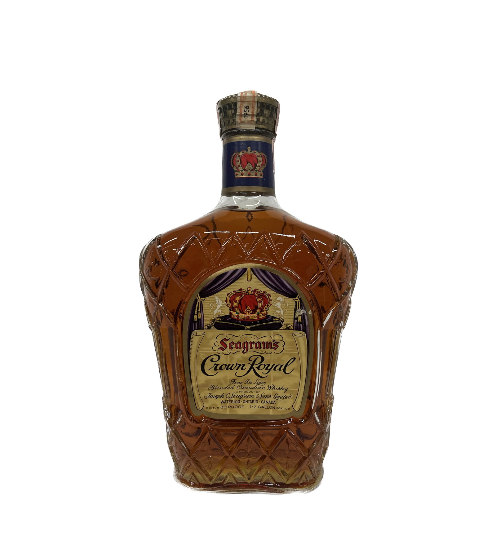 Sealed 1956 Seagrams Crown Royal Whiskey 1/2 Gal: Sealed Vintage 1956 Bottle of Seagram's Crown Royal Blended Canadian Whiskey Stamp Label 1/2 Gallon 11.4" Tall in Overall Good Condition Please look at Photos Closely Out of a New York City Estate