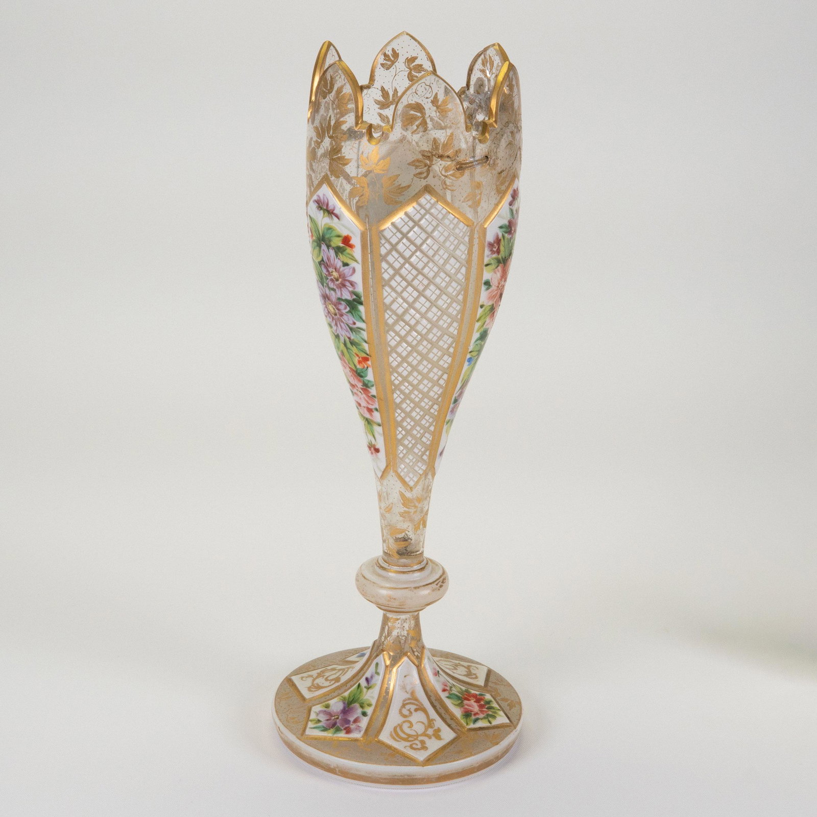 Bohemian Enamel Glass Vase Painted Flowers: Bohemian Enameled Overlay Painted Cut Art Glass Vase Painted with Panels of Flowers Moser ? Circa 19th Century Dimensions 9" H 3.5" W Item Fixed with Staples in 19th Century Due to Age and Use In Over