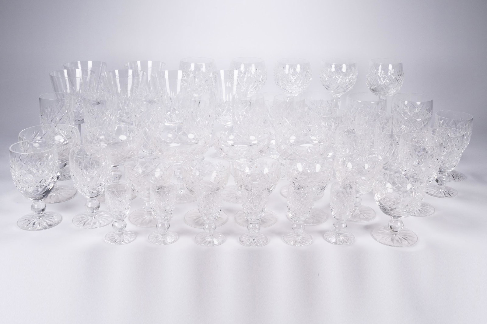 48pc Lot Waterford Crystal Stemware Lismore Pattern: 48 Piece Lot of Waterford Crystal Stemware Lismore Pattern Aroca Pattern Include 6 Lismore 1952 Goblet 7"H 5 Wine Glasses 7.5" H, 4 Waterford Crystal "Donegal " White Wine 4.5" H, 6 Waterford Crystal 