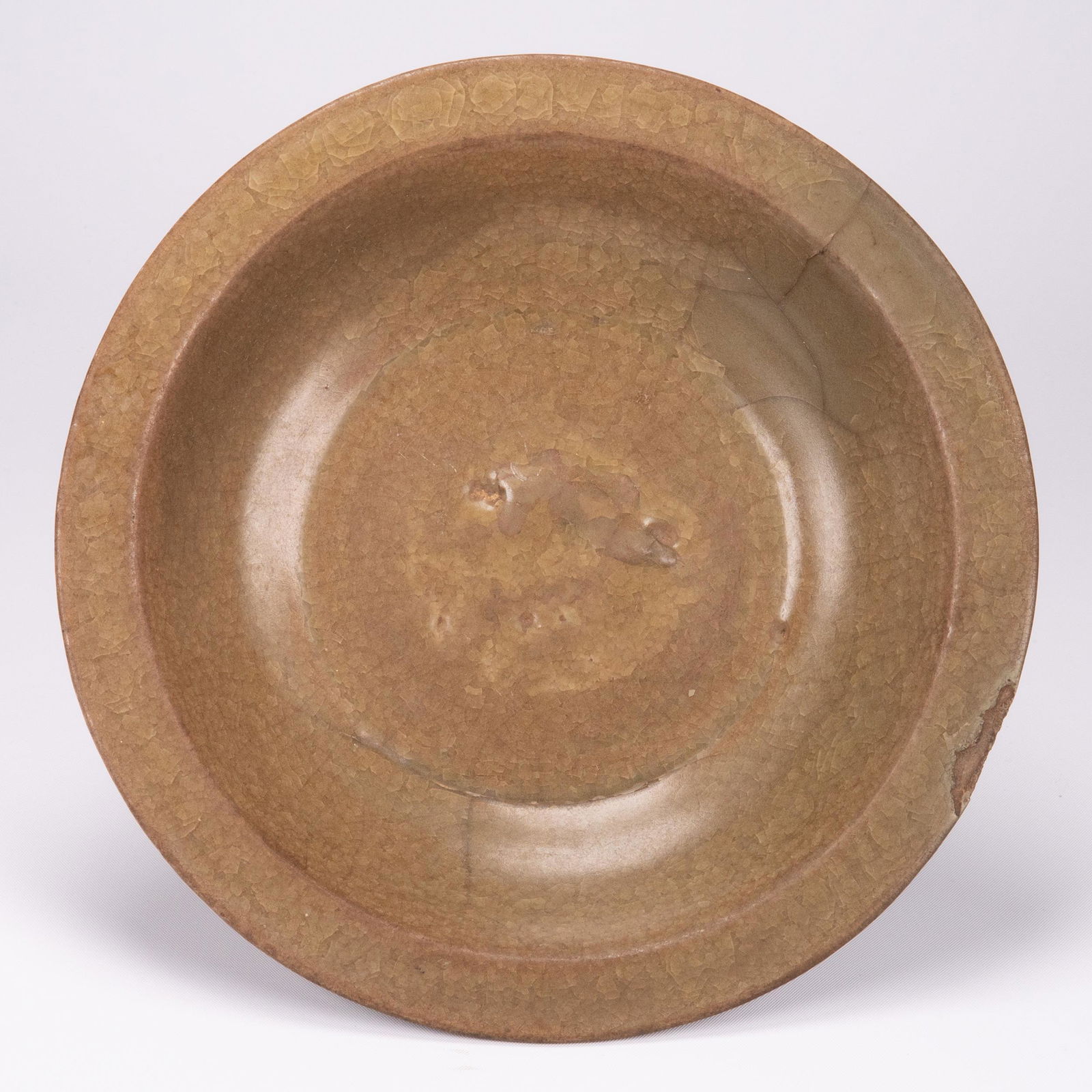 Chinese Longquan Celadon Ceramic Bowl: Chinese Longquan Celadon Porcelain Ceramic Bowl with external Lotus petals - like grooves 8"W x 2"H Due to use and age In Overall Good Condition Please look at Photos Closely Out of a New York City Es