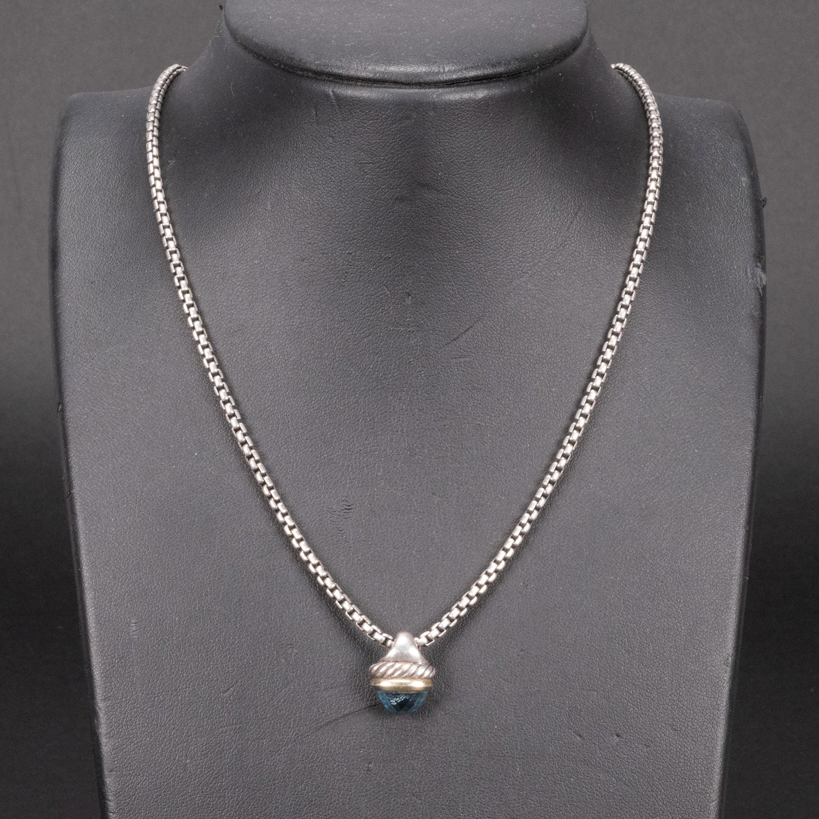 David Yurman 14k Sterling Blue Topaz Necklace: David Yurman 14 Karat Gold and Sterling Silver with Blue Topaz Acorn Necklace One Bezel set Blue Topaz Stone set in 14k Yellow Gold 16.5" Signed / Marked with Bag in Overall Good Condition Please look