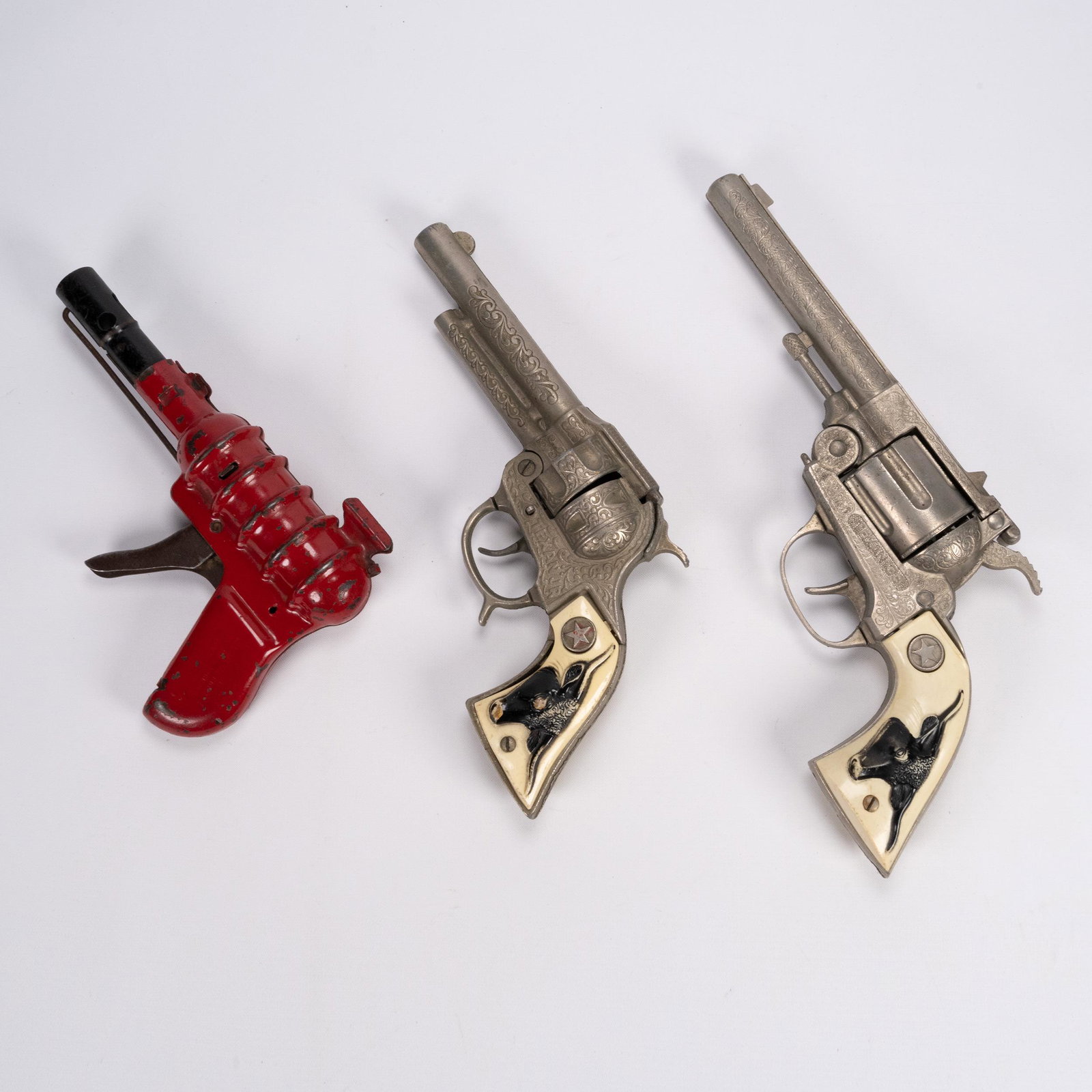 Hubley Texan JR Cap & Buck Rogers Red Gun: Hubley Texan JR Cap Gun (Pair) and Buck Rogers Red Wyandotte Hand Gun all in Working Order Out of a South Shore Long Island Estate