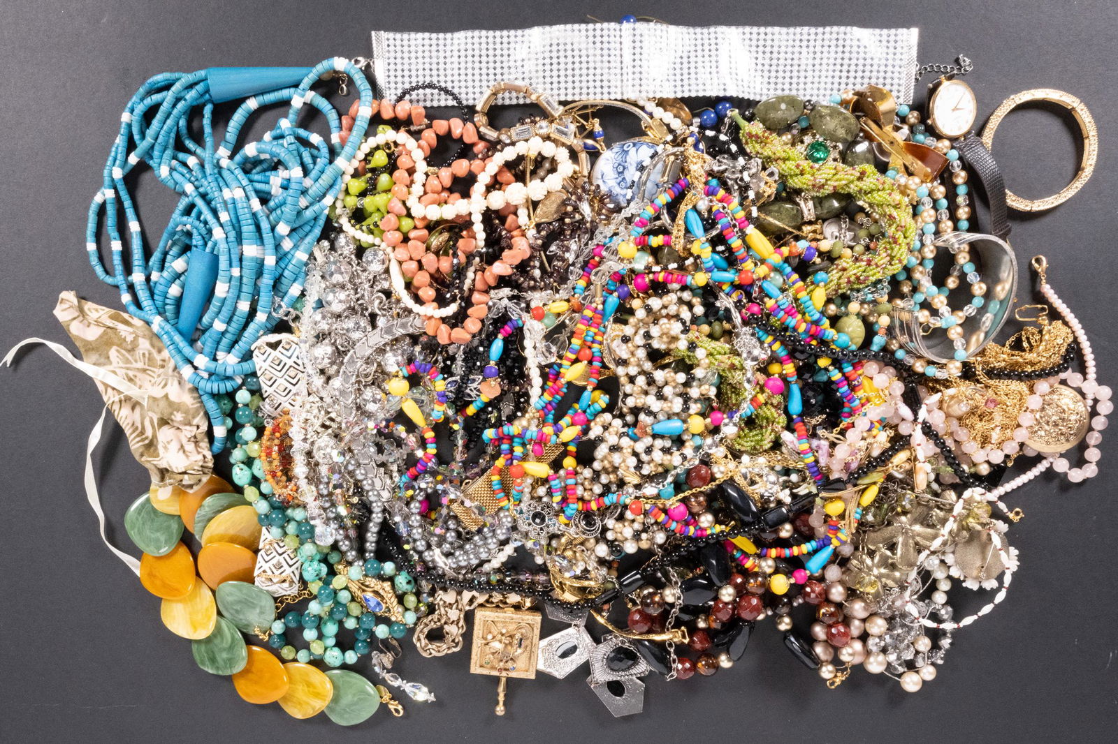 Unsearched Costume Jewelry Lot Bracelets Necklaces: Large Lot of Unsearched Costume Jewelry May Include: Bracelet Necklace Ring Earing Bangle Pin Brooch Cuff link and Much More In Overall Good Condition Please look at Photos Closely Out of a New York C